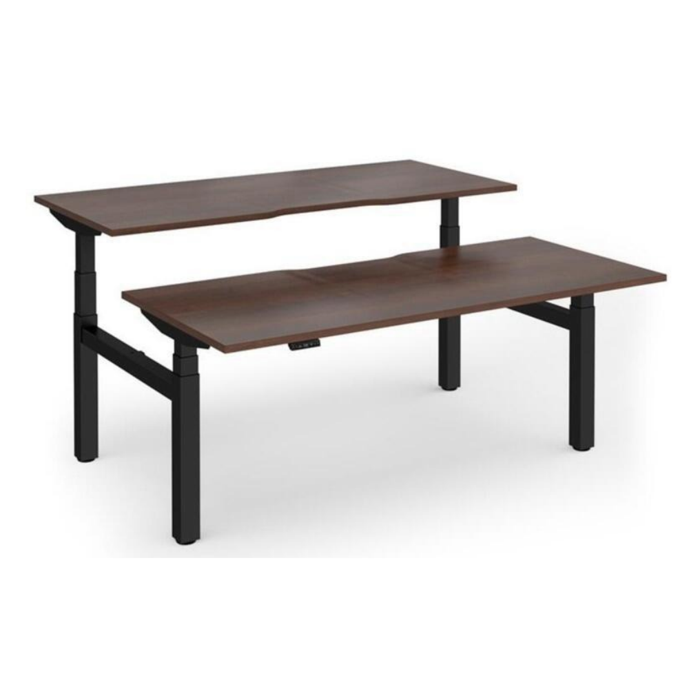 DAMS Elev8 Touch sit-stand desk, walnut tops on a black frame, back-to-back pair with one desk raised to standing height