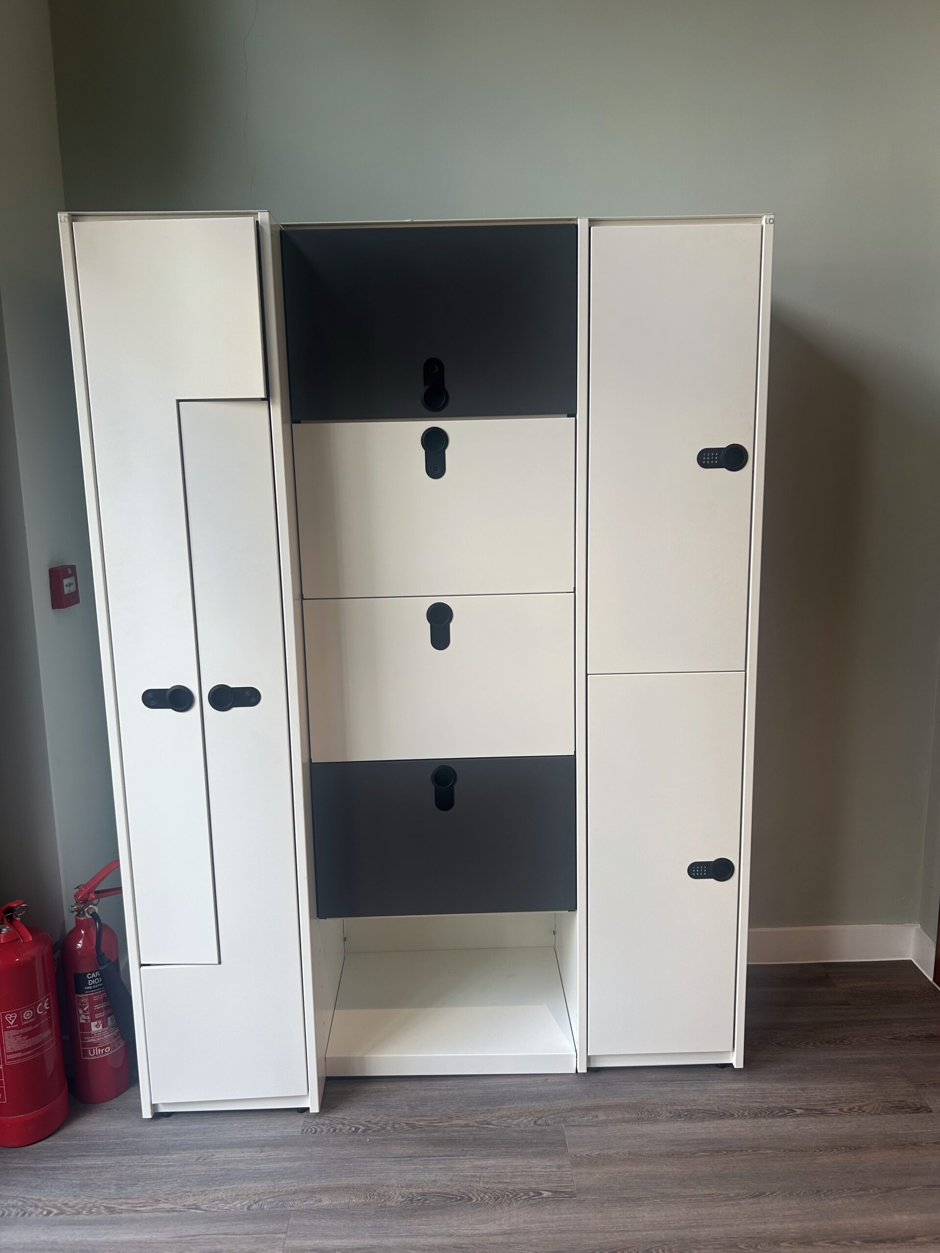 Lista Office LO Guard Locker in white and anthracite, front view with the left bay door open