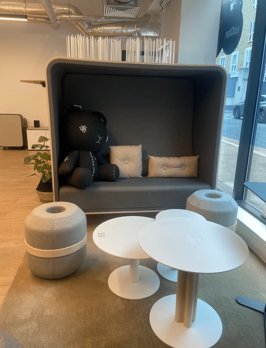 Loook Box Sofa in the Loook showroom, dressed with cushions