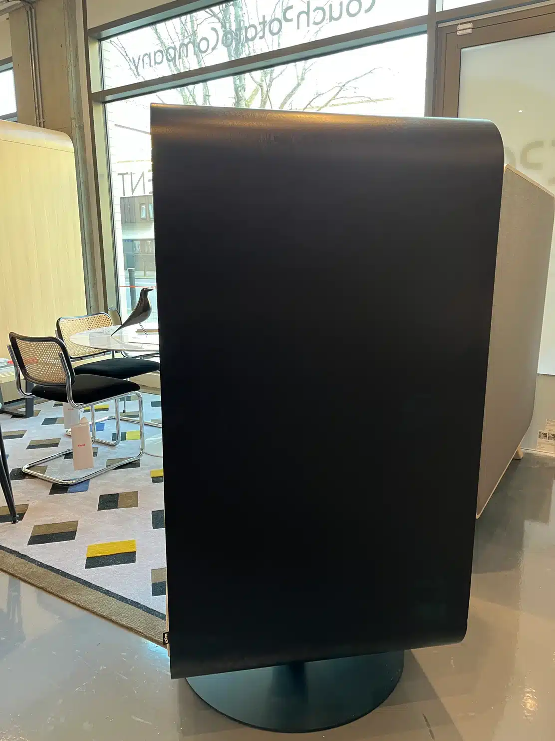 Loook The Box Lounger, rear view showing the dark outer shell and pedestal base