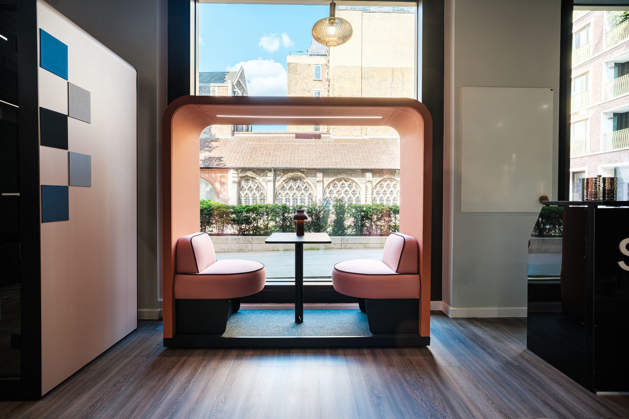 Silen Bridges Mobile in clay, front view of a single booth in a showroom